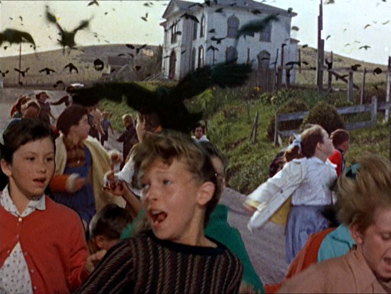 Children fleeing the schoolhouse as birds attack